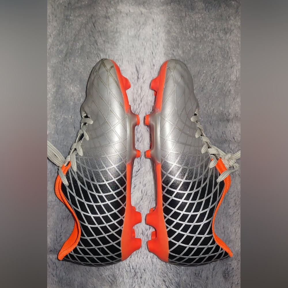 Boys Silver and Orange Soccer Cleats